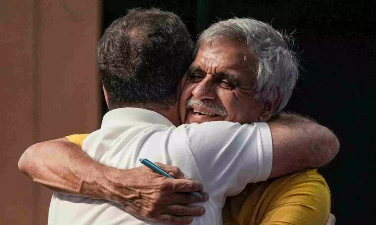 Rahul Gandhi hugs Sandeep Dikshit during Rachnatmak Congress National Convention in New Delhi