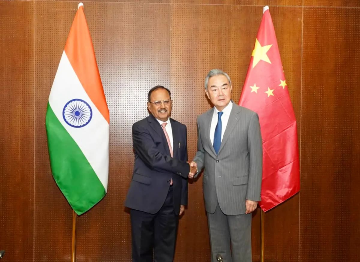 Chinese Foreign Minister Wang Yi meets Indian National Security Advisor Ajit Doval during bilateral discussions in New Delhi.