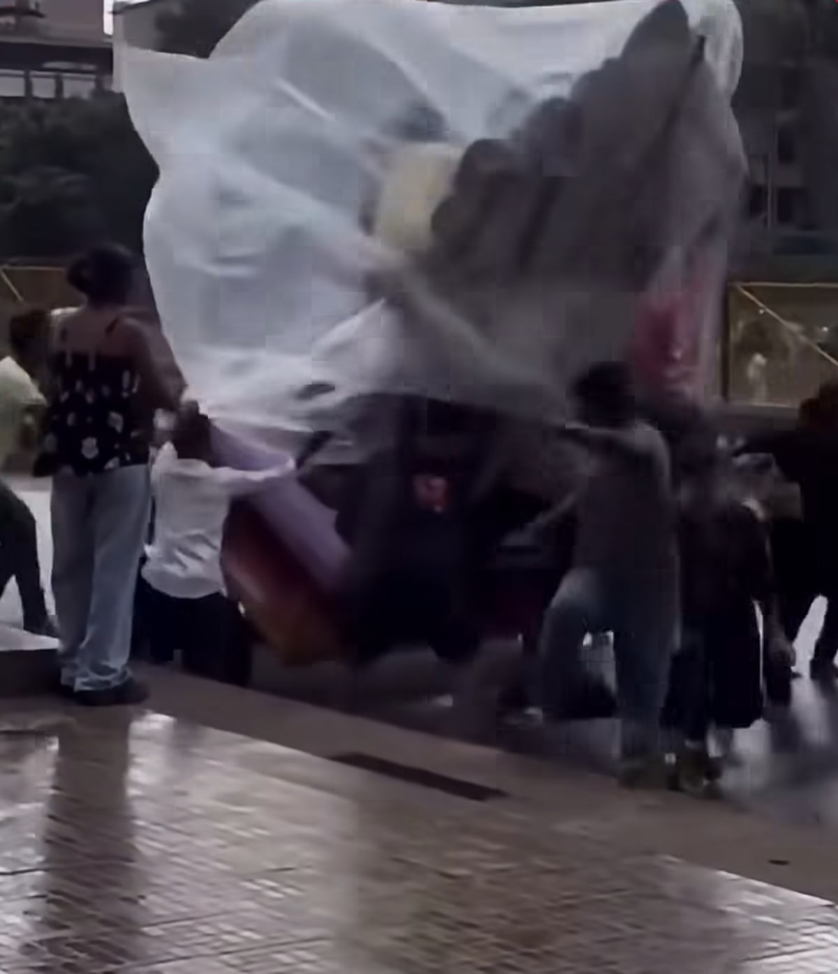 Ganesh Idol Topples Amid Heavy Rain in Maharashtra, Devotees Trapped and Rescued - NationPath Image
