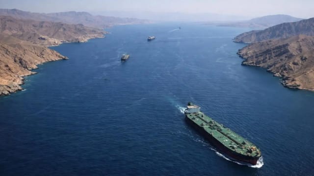 Oil tankers in the Strait of Hormuz amid global oil supply disruptions.