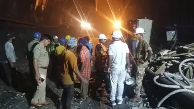 Rescue teams conduct operations at the water-filled tunnel in Chamoli, Uttarakhand