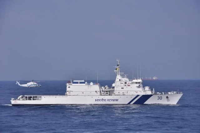 Indian Coast Guard vessels conducting maritime operations at sea.