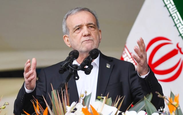 Iranian President Masoud Pezeshkian speaking at an official event.