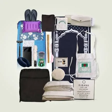 A folded white ihram set