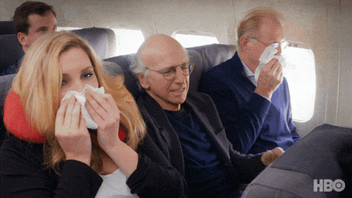 Passengers would often go to great lengths just to avoid the airplane middle seat - Flying Baguette An annoyed airline passenger sitting in a middle seat