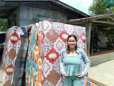 Agnes and Nelson's foam production increased with the help of the loan she obtained.