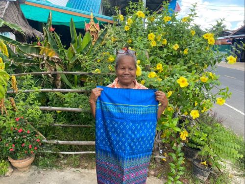 Ampai is thankful for the chance to continue weaving silk from home