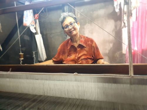 Yuean used her weaving skills to provide for her family despite hardship.