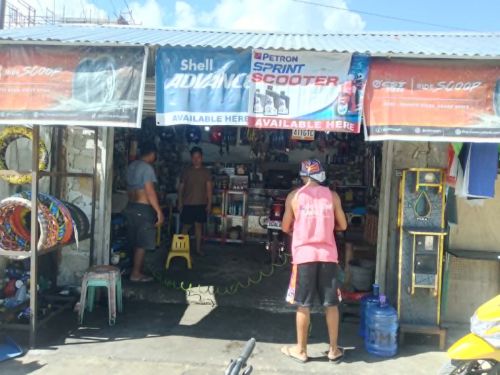 Merry Chris restocked her shop with a variety of motor spare parts using the loan she acquired.