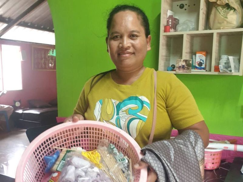 Somying strengthened her sewing business with new equipment.