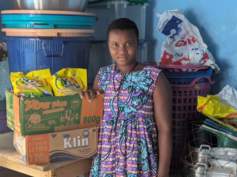 Brigitte successfully boosted her household goods business with her microloan