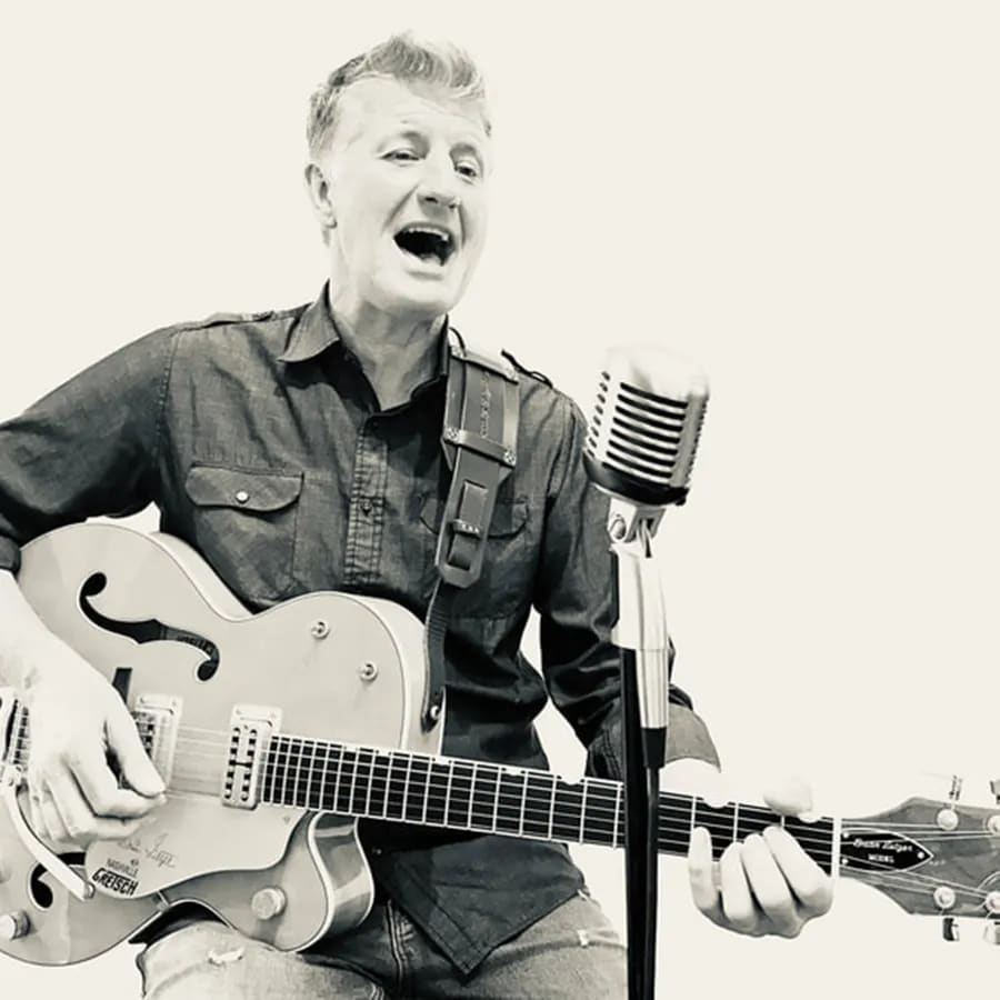 LIVE MUSIC: John Sharkey plays the Barnyard Stage