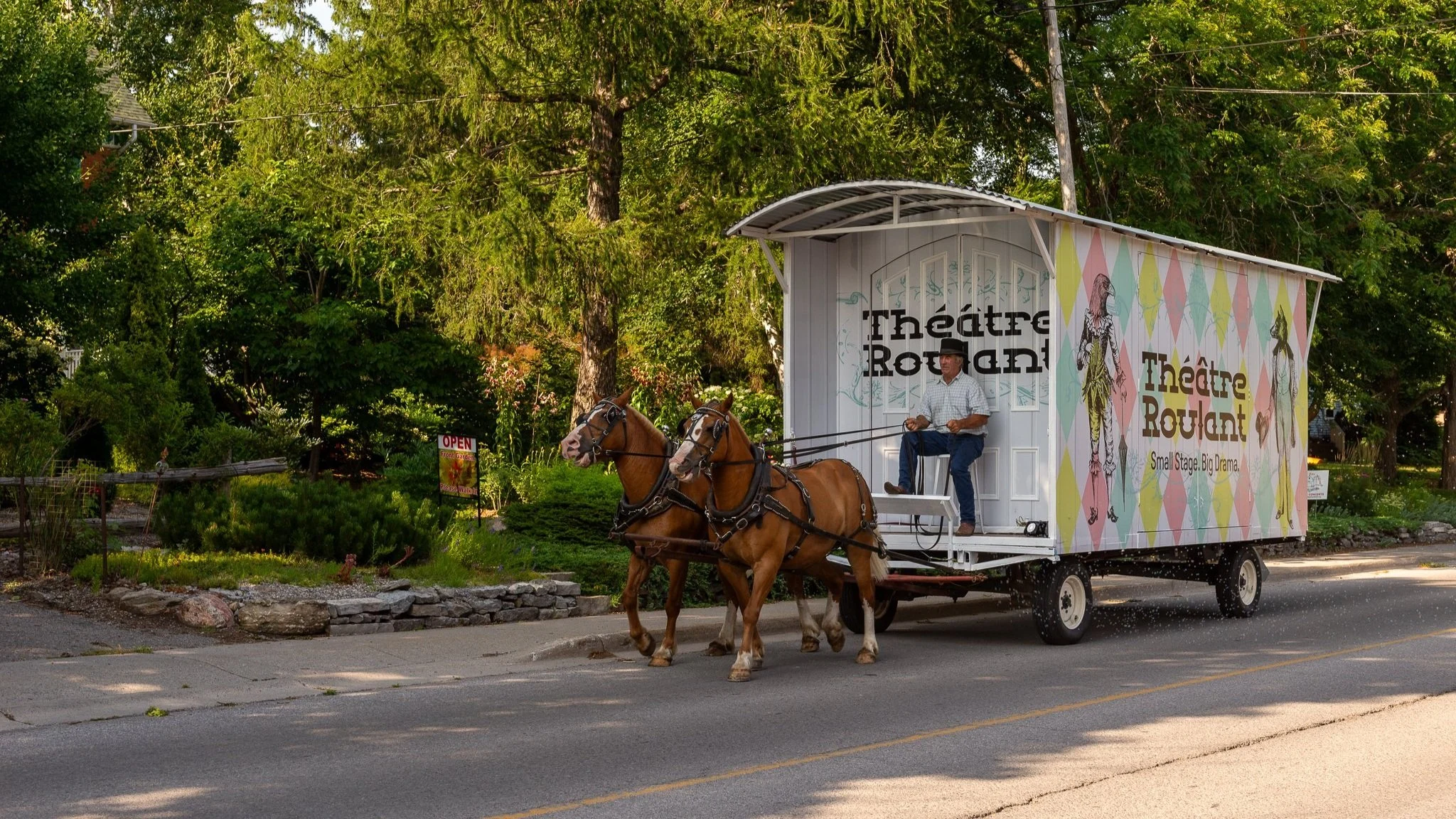Canada's only horse drawn theatre caravan. Pictured here is our theatre caravan piloted by Blaine Way and pulled by horses Susie and Sarah. Photo by David Vaughan