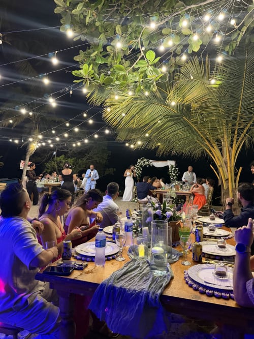 Dinner under string lights - real wedding held at Villa Lotus Tolú, Colombia