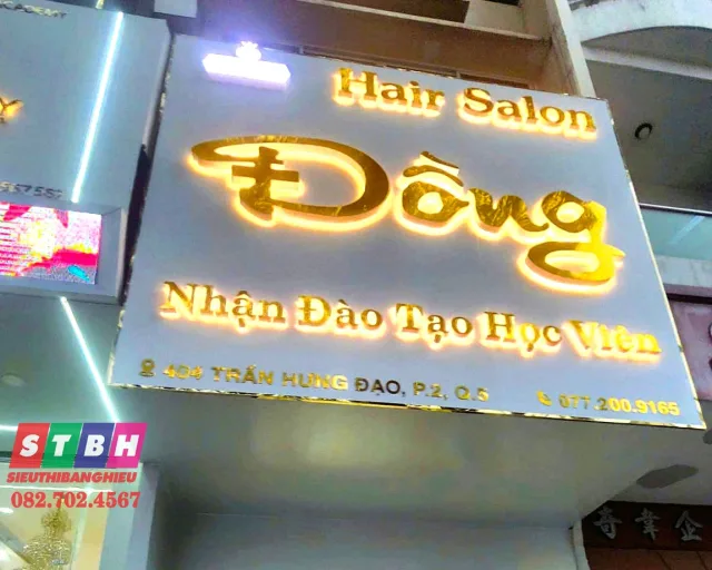 Bảng hiệu inox vàng gương