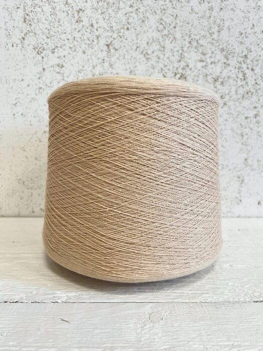 Beige standing yarn cone