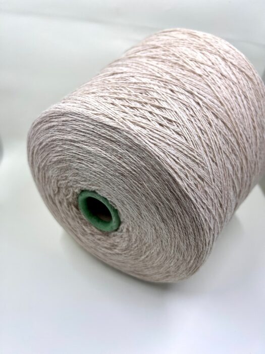 Light beige tilted yarn cone