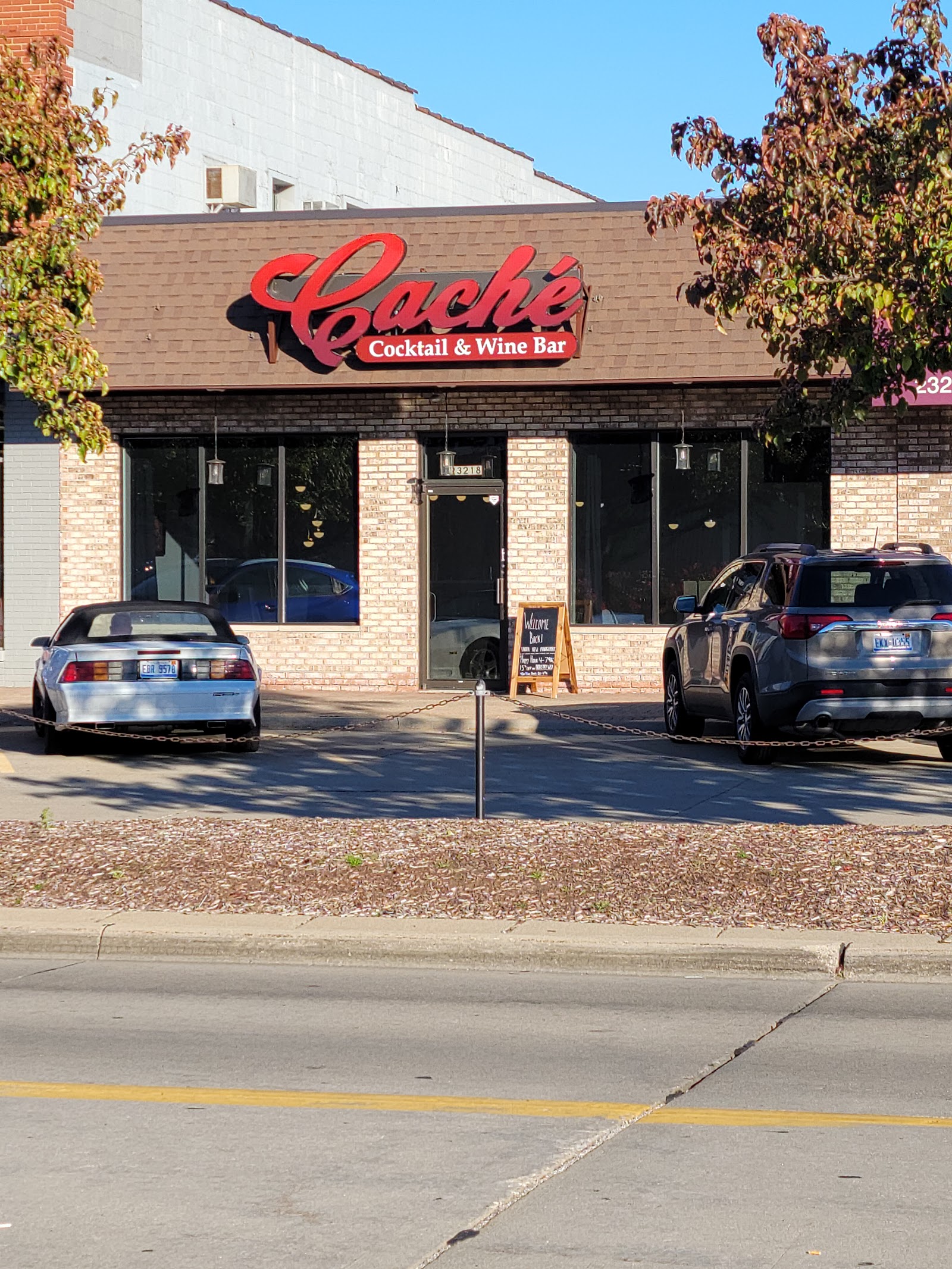 Cache' Cocktails and Wine Bar logo