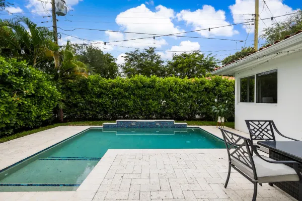 New pool construction in Miami with waterfall