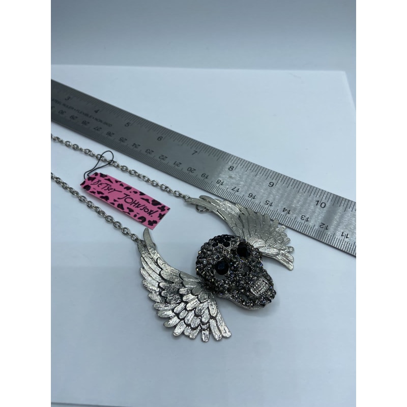 Buy the Betsy Johnson Silver Tone Rhinestone Skull Pare Wing But Necklace  46.7g | GoodwillFinds
