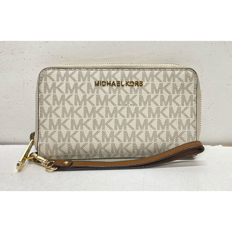 Buy the Michael Kors Monogram Signature Jet Set Zip Around Wallet Vanilla GoodwillFinds