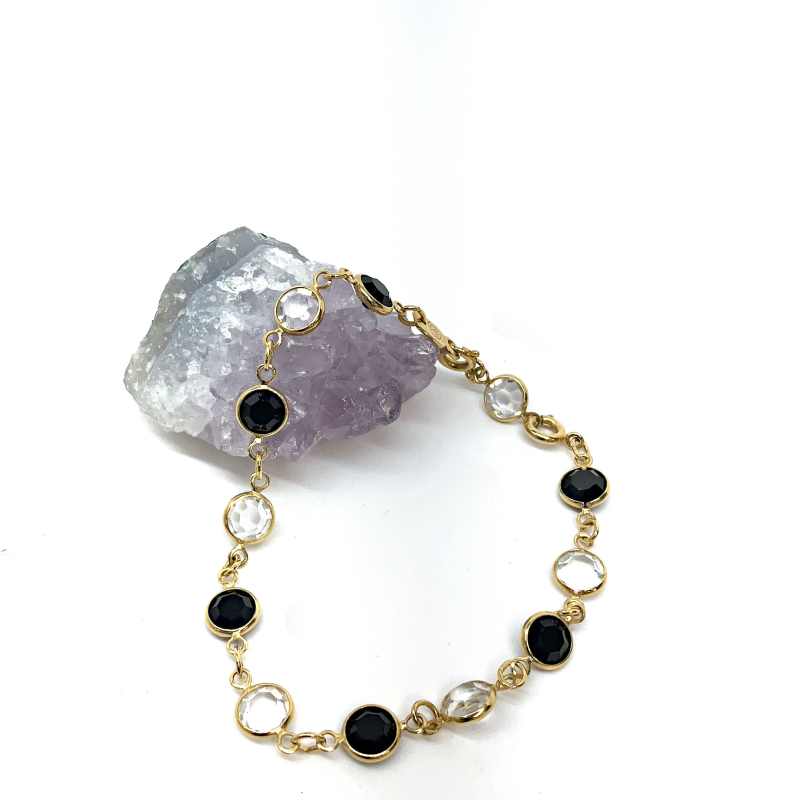 Buy the Designer Swarovski Gold-Tone Onyx And Clear Crystals