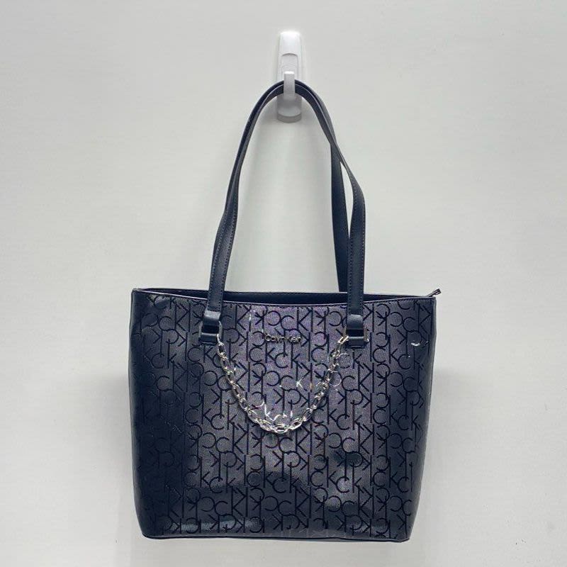 Ck monogram bag best sale