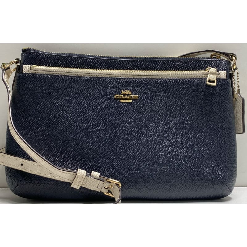 Coach east west crossbody with pop up pouch online