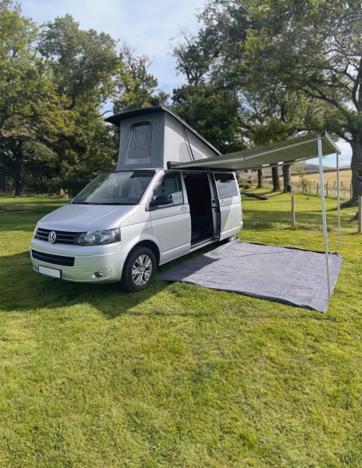 Selene the Camper parked with the pop-top up and awning open