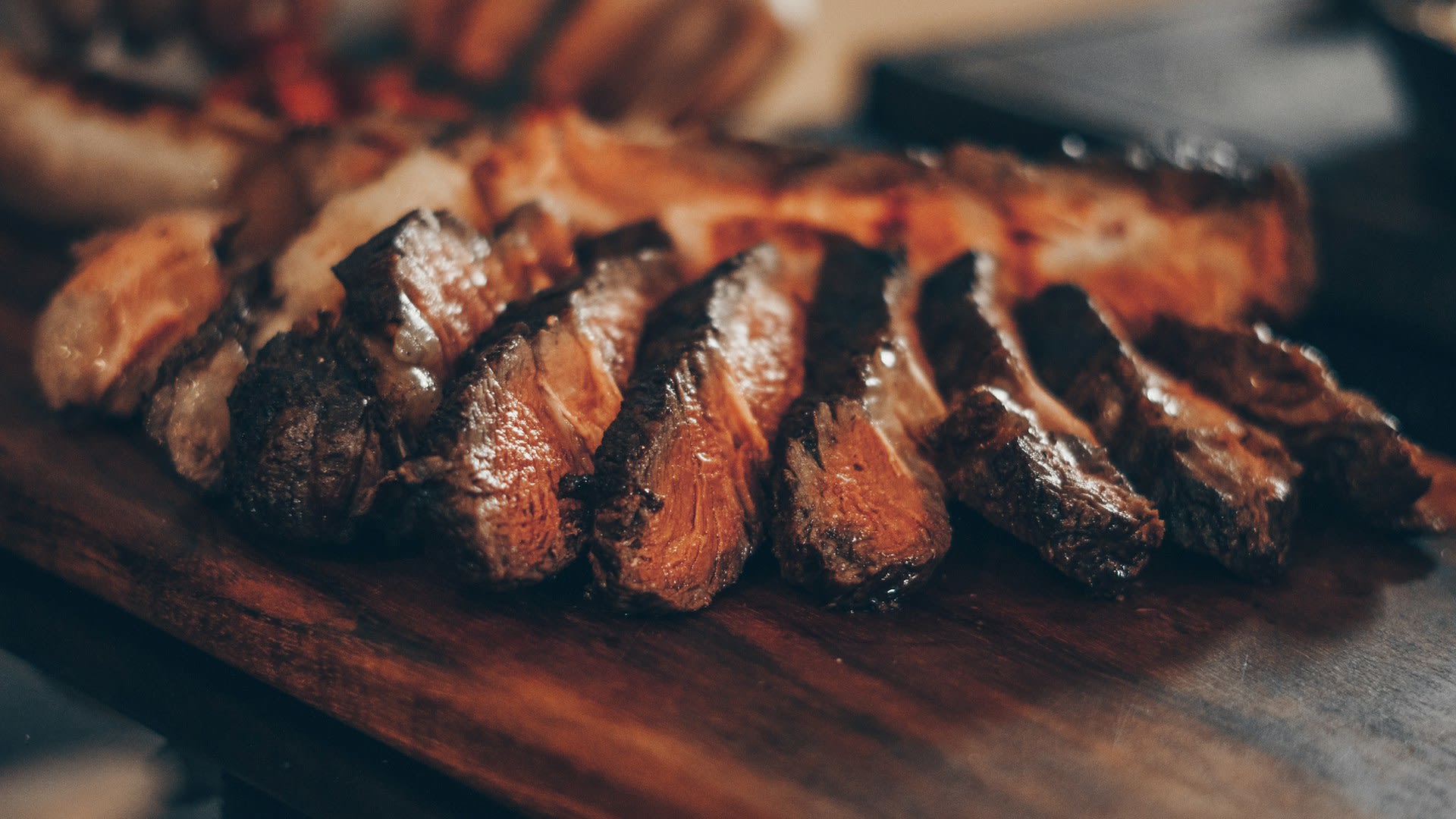 BBQ spread featuring smoked meats and sides
