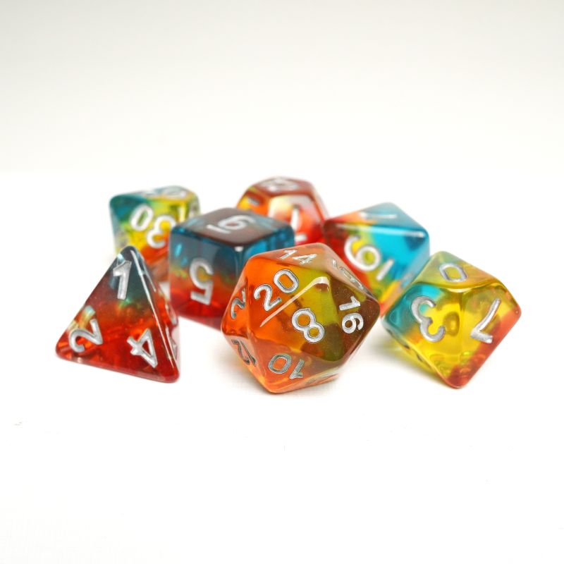 Spread of rainbow dice on white background, featuring colorful DND dice.