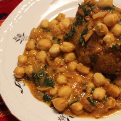 Chickpea curry on baked potato