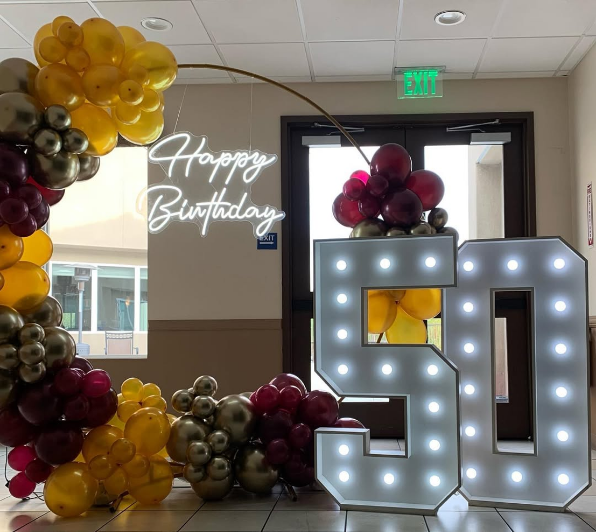 Styled backdrop and décor display by Sassy Decorations Orange County California