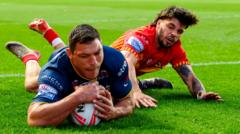 Leeds stay top with eight-try win over Catalans