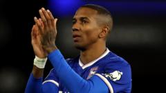 Former England international Young to retire at 40