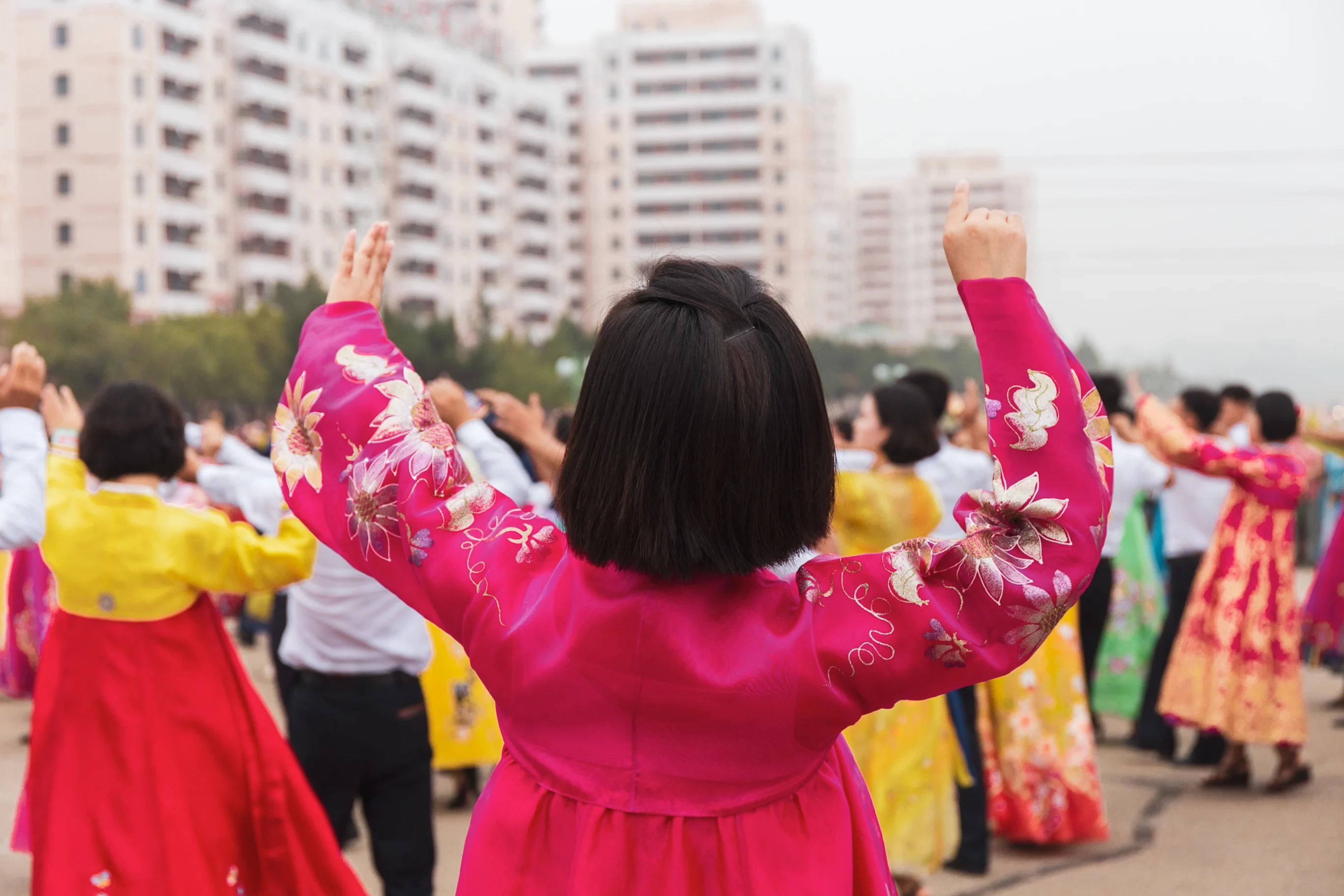 Photo of a North Korean person playing an instrument
