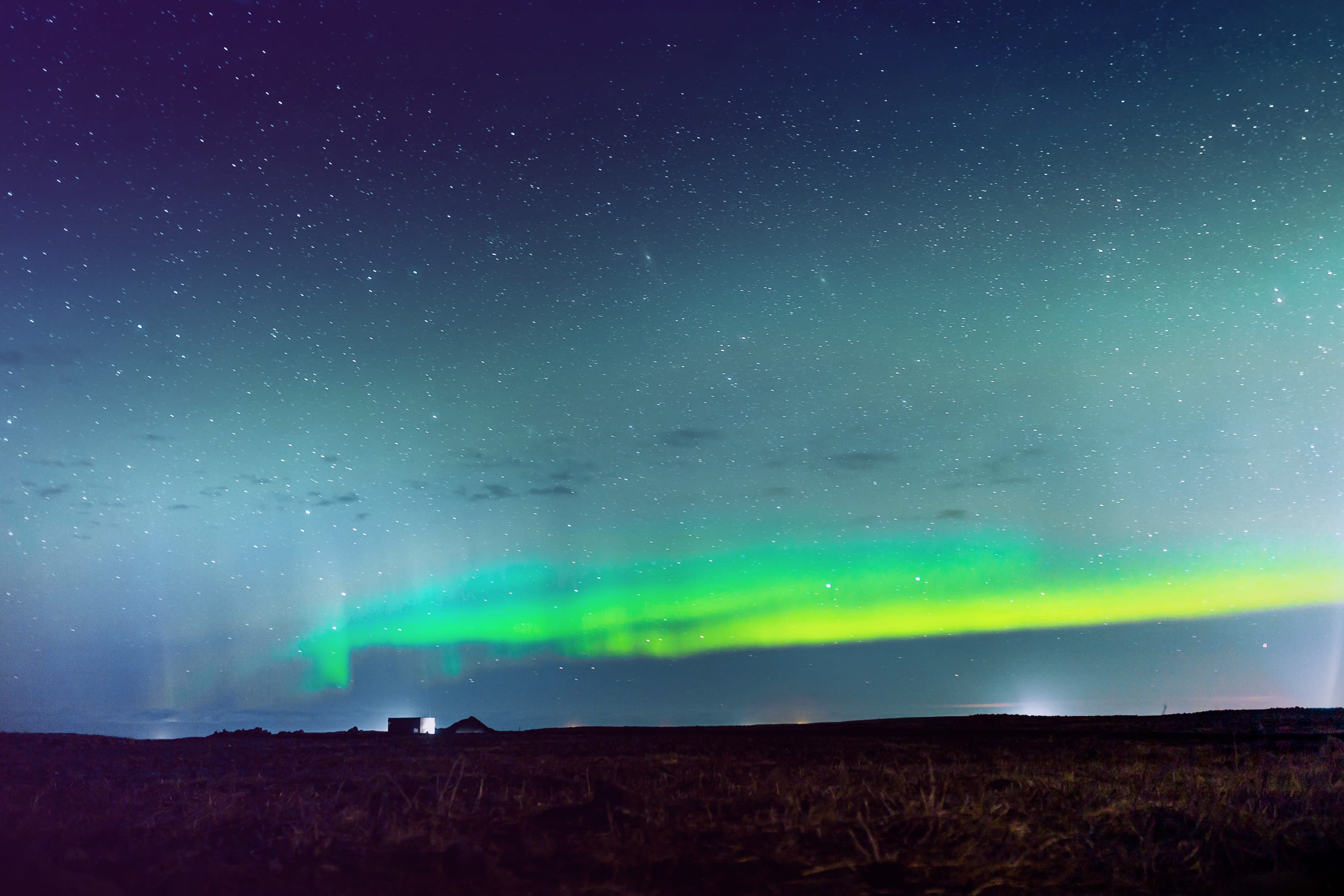 The aurora borealis form when highly charged electrons from the Sun's solar winds penetrate the Earth's magnetic field and collide with atoms (Oxygen and Nitrogen) in our atmosphere. These collisions result in a dance of light which make up the aurora.