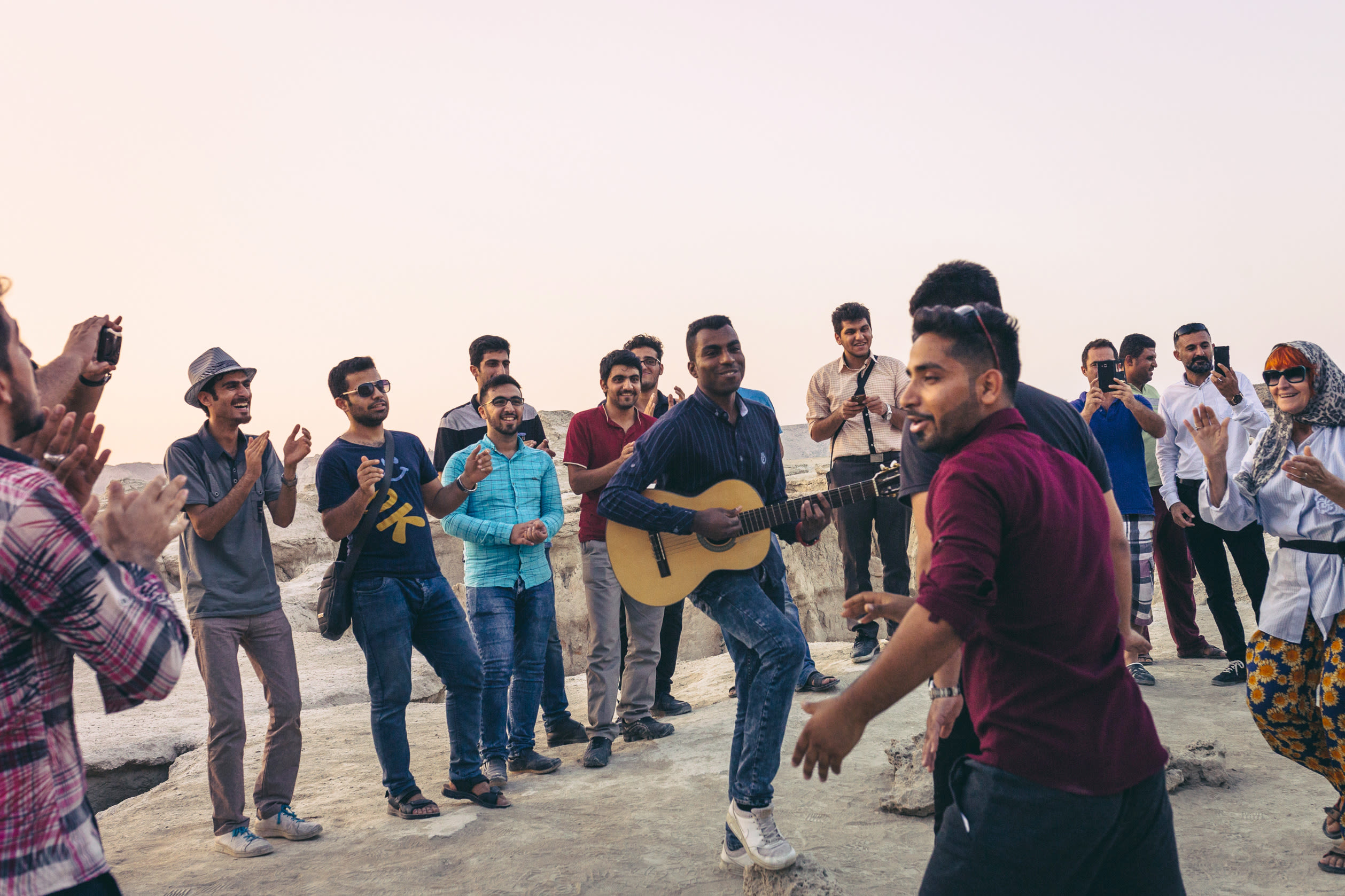 This is one of many moments that I've been fortunate enough to witness. Just one happy dance circle, around classical guitar tunes, on top of a canyon during sunset on an island.