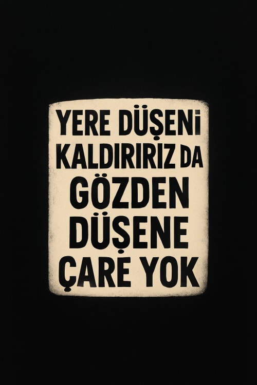 Siyah renkte ortasında beyaz yüzeye şöyle bir yazı ‘’ yere düşeni kaldırırızda gözden düşene çare yok’’
