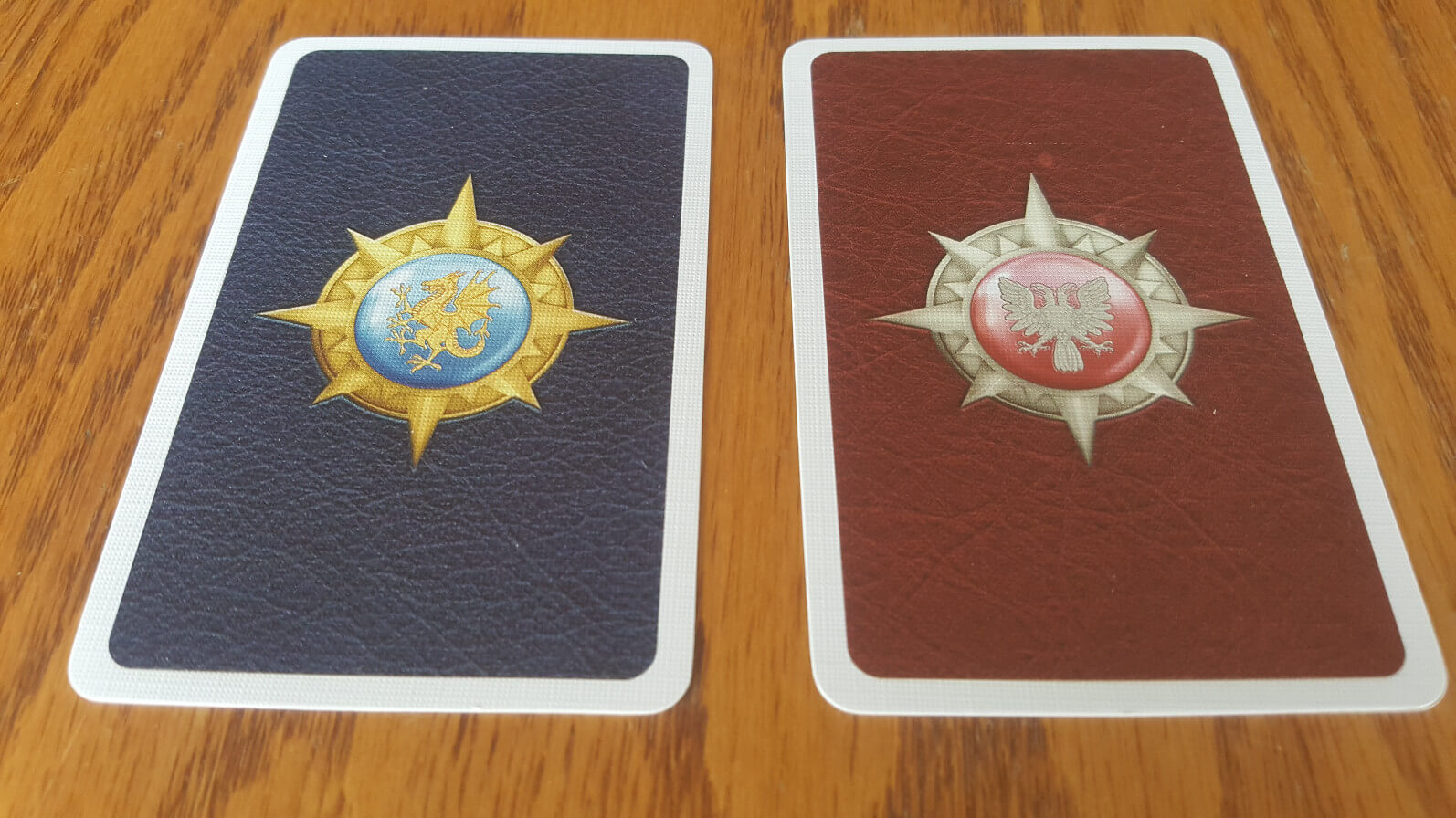 The good and evil player cards in Avalon