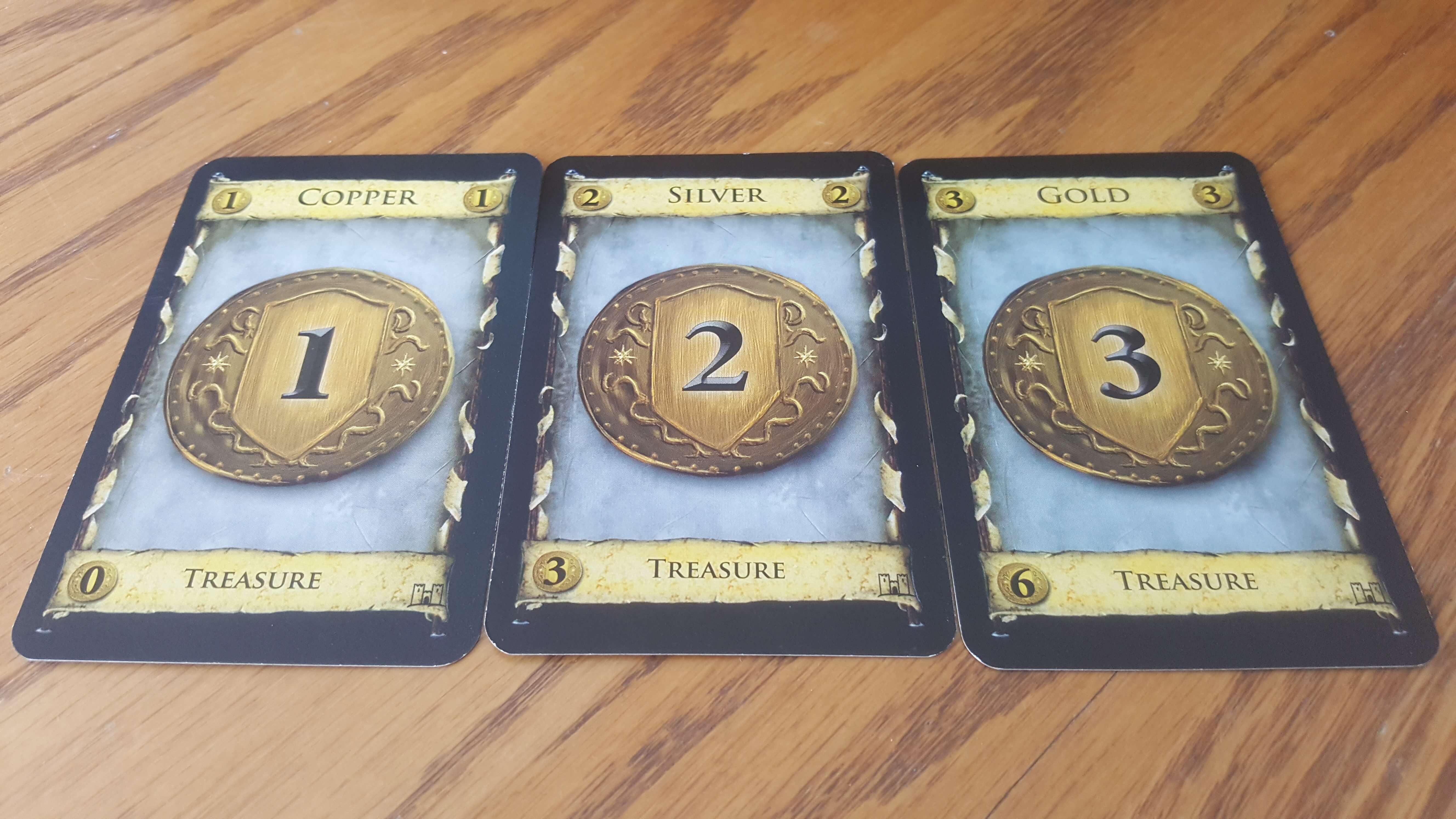 Dominion currency cards Dominion currency cards used to buy from the kingdom