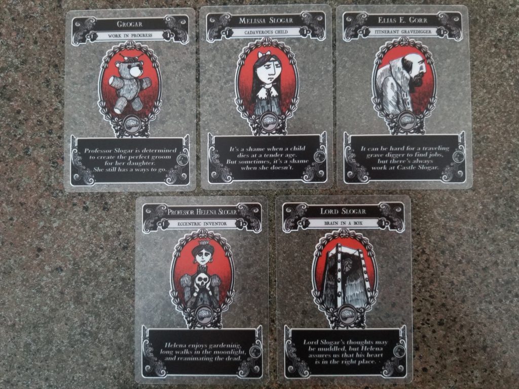 A Gloom family A Gloom family of characters laid out on the table
