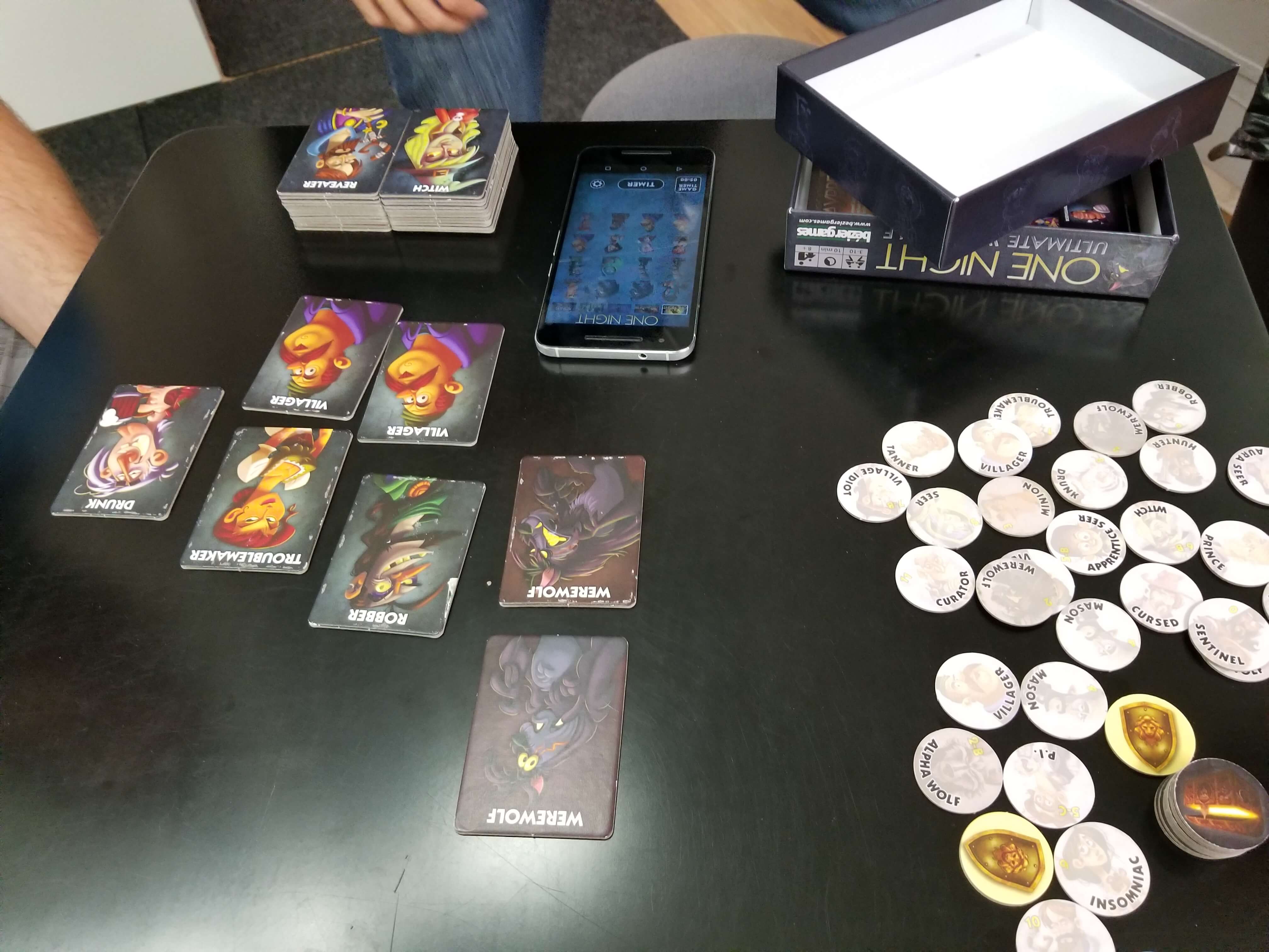 The One Night Ultimate Werewolf role cards laid face-up