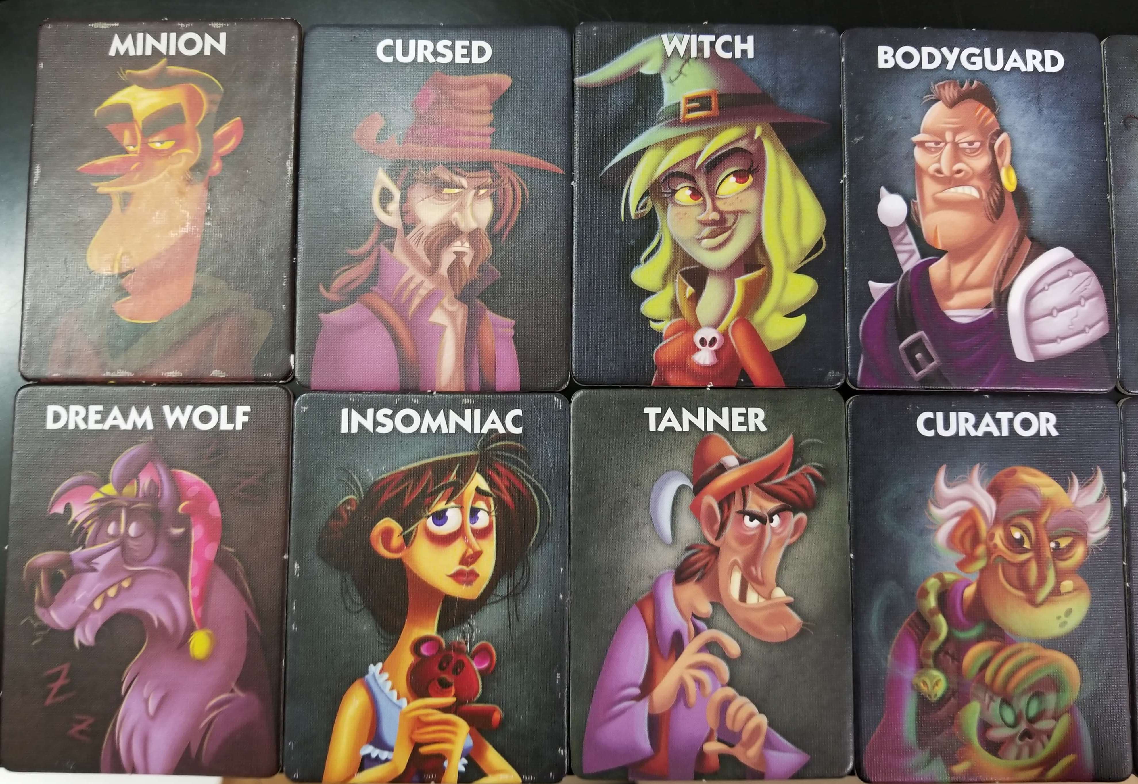 A spread of the different role cards in One Night Ultimate Werewolf