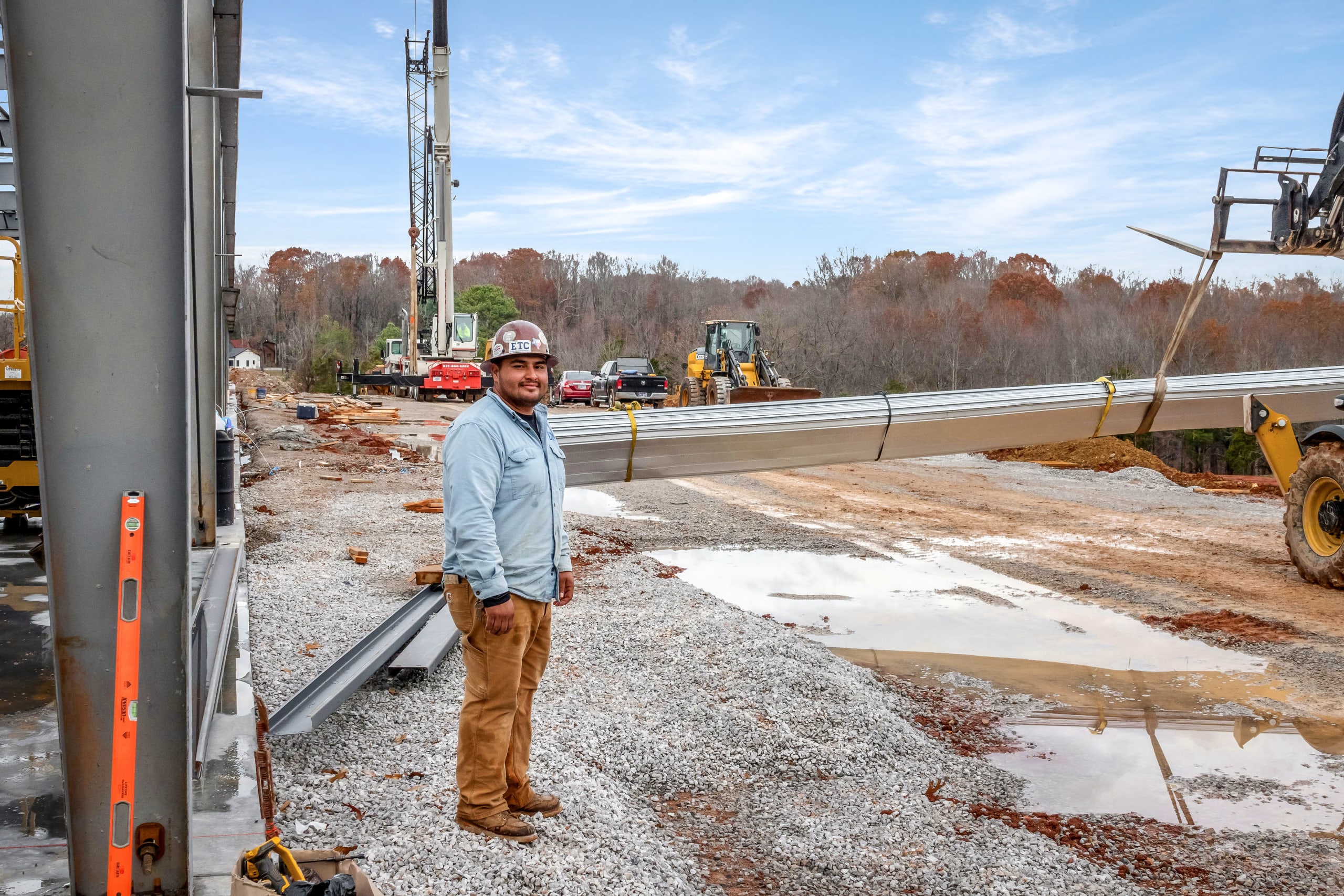 Man standing in front of the construction for Winsupply cookeville
