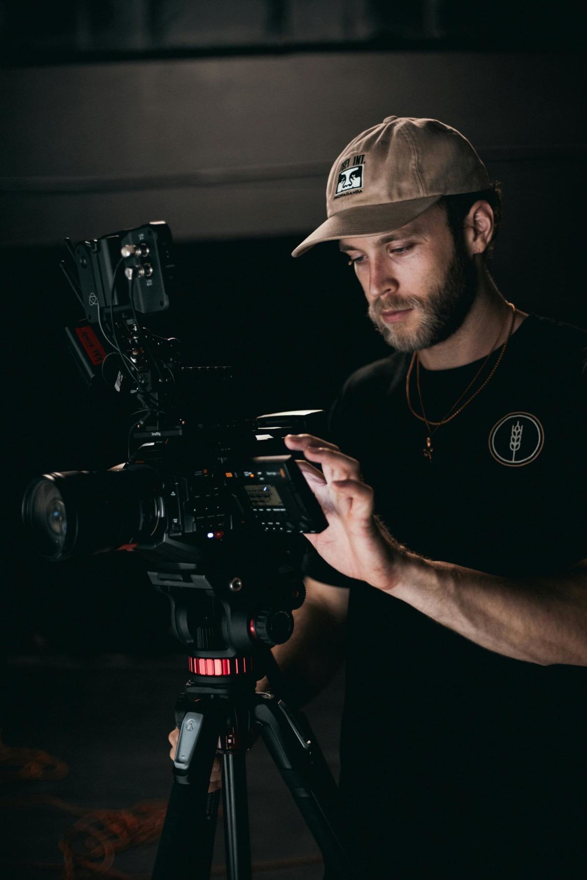 Director filming on location with camera