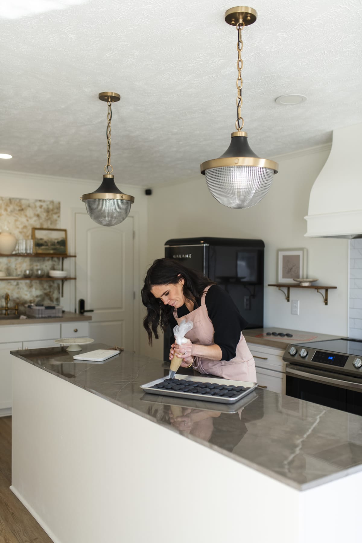 Baker working in her home kitchen