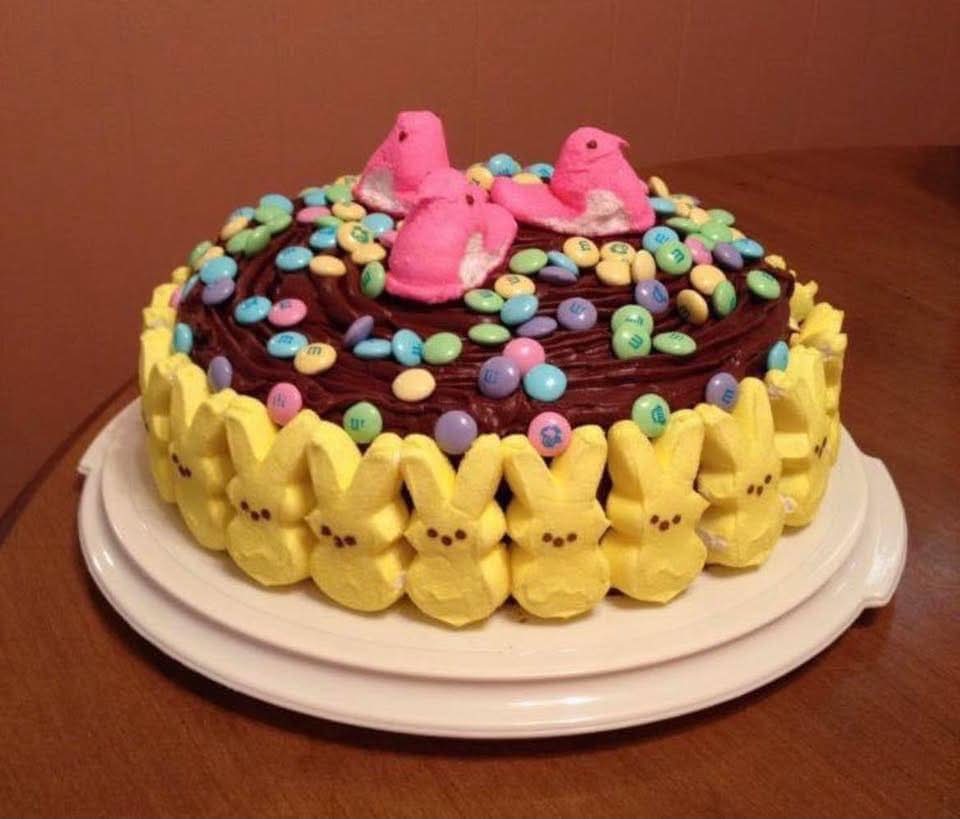 Chocolate Easter cake decorated with yellow marshmallow Peeps bunnies and pastel candies, made by Kountry Kreations in Bolivar, Tennessee
