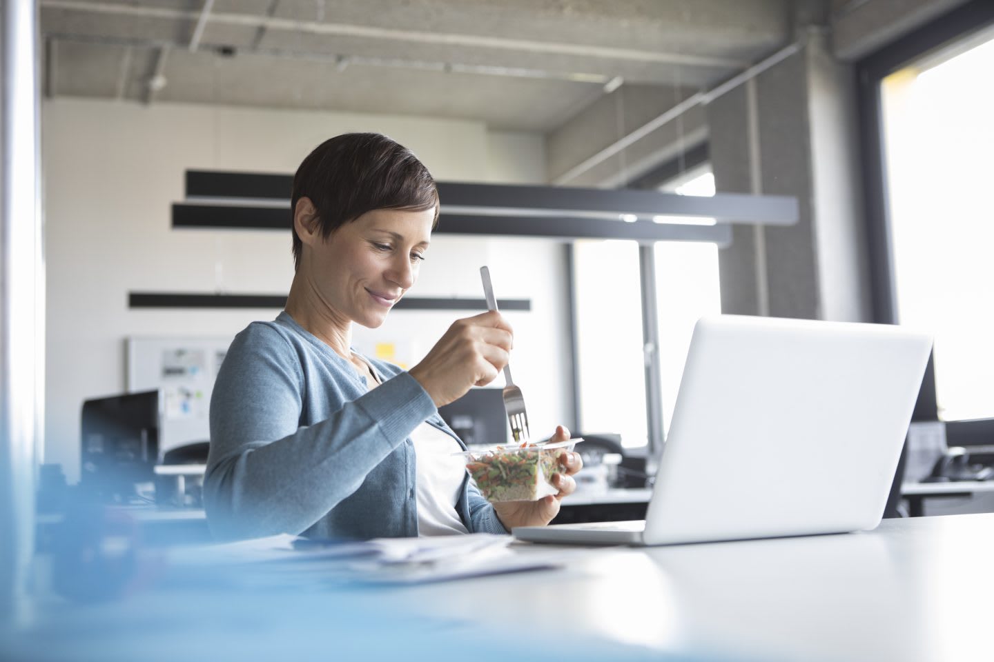 Businesswoman in office having lunch break, healthy nutrition, habits, adidas, GamePlan A, goal-setting, adidas, GamePlan A, lifestyle, clean eating