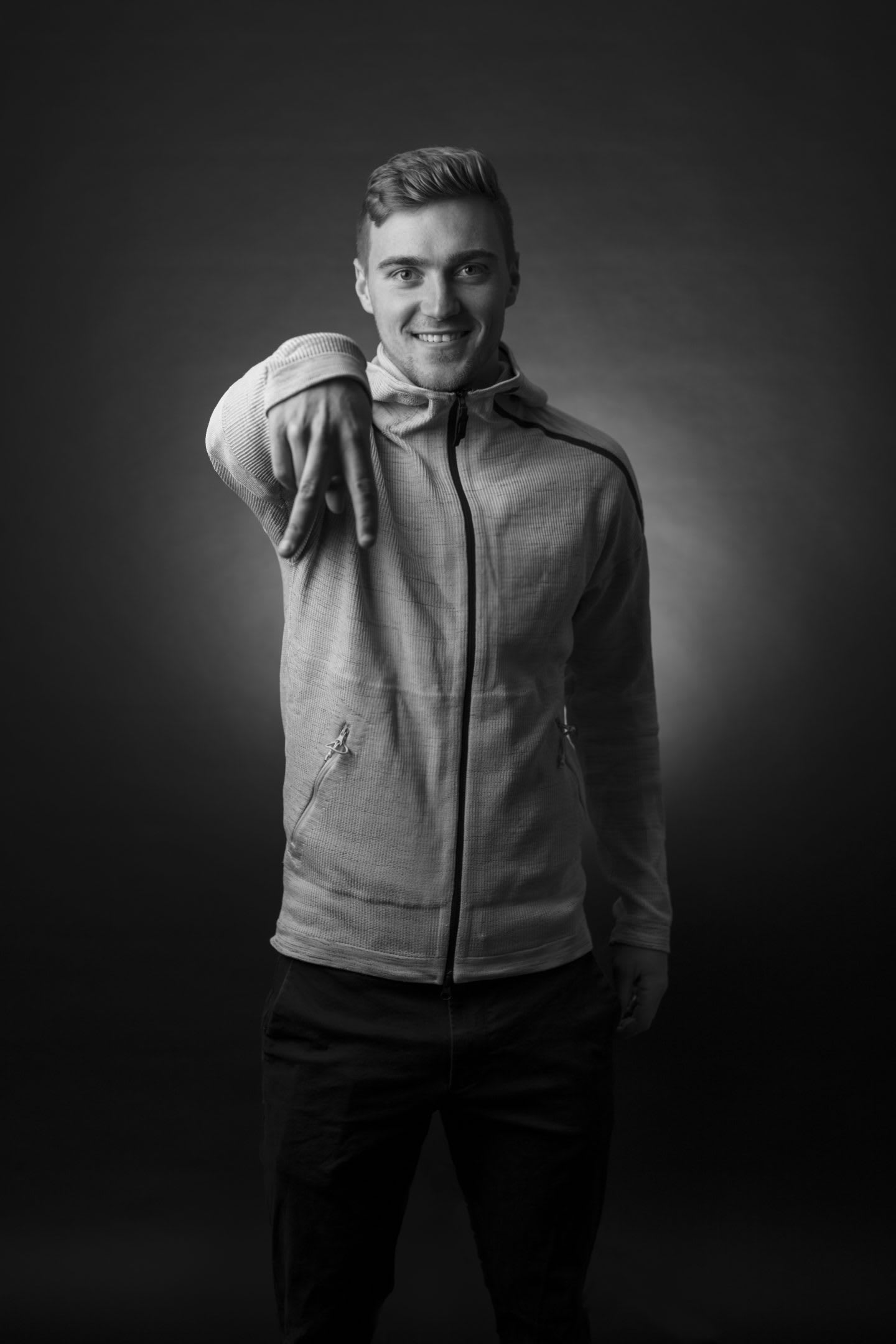 Julian Gressel stands in place signing the letter A with his hands. MLS, Soccer, Athlete, Rookie, adidas, USA, working abroad, relocation
